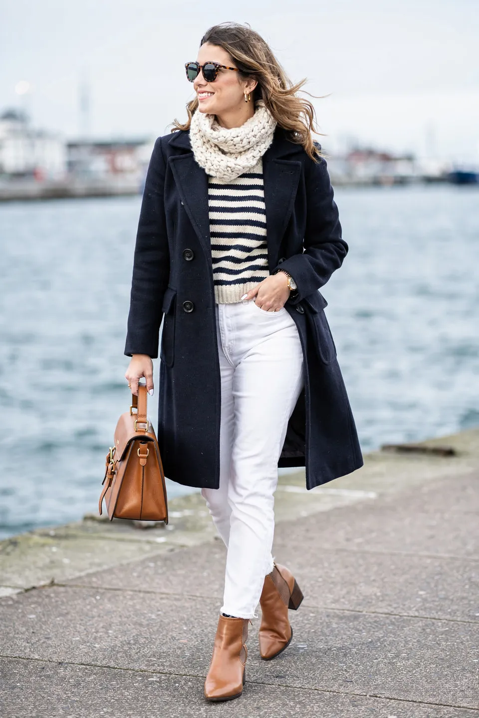 Navy Peacoat with Striped Sweater and White Jeans by the Harbor Navy Peacoat with Striped Sweater and White Jeans by the Harbor